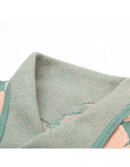 Knitwear manufacturer Winter new long sleeved green classic lapel mid length women knitted sweater coat